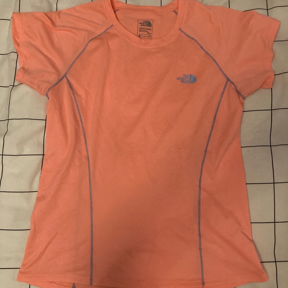 Orange northface women’s athletic shirt